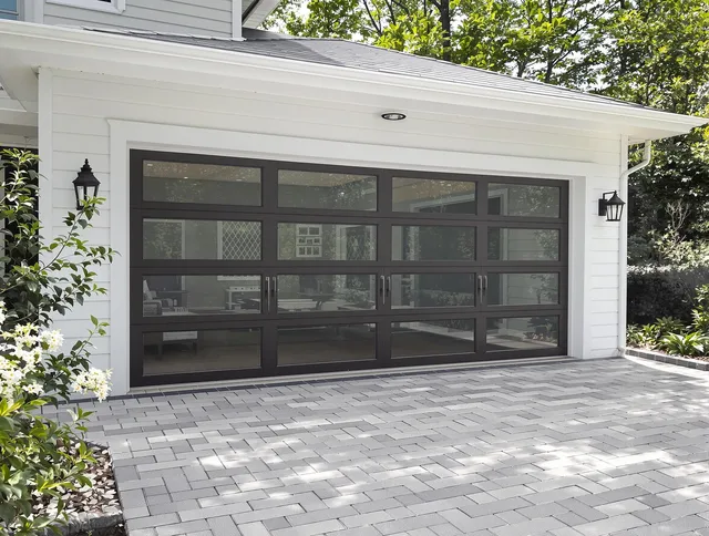 Deltona Garage Door Repair design specialist presenting custom garage door options to Deltona homeowner