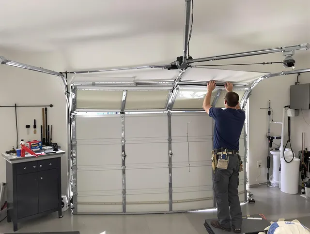 Deltona Garage Door Repair specialist performing precise section replacement on Deltona garage door